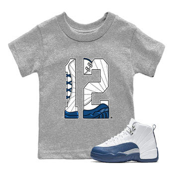 Number 12 baby and kids t-shirt crafted for little sneakerheads to shine with the Air Jordan 12 French Blue sneakers, displayed in Heather Grey 1.