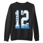 Number 12 sneaker match t-shirt styled to complete your fit with the Air Jordan 12 White and University Blue sneakers, shown in Black 2.