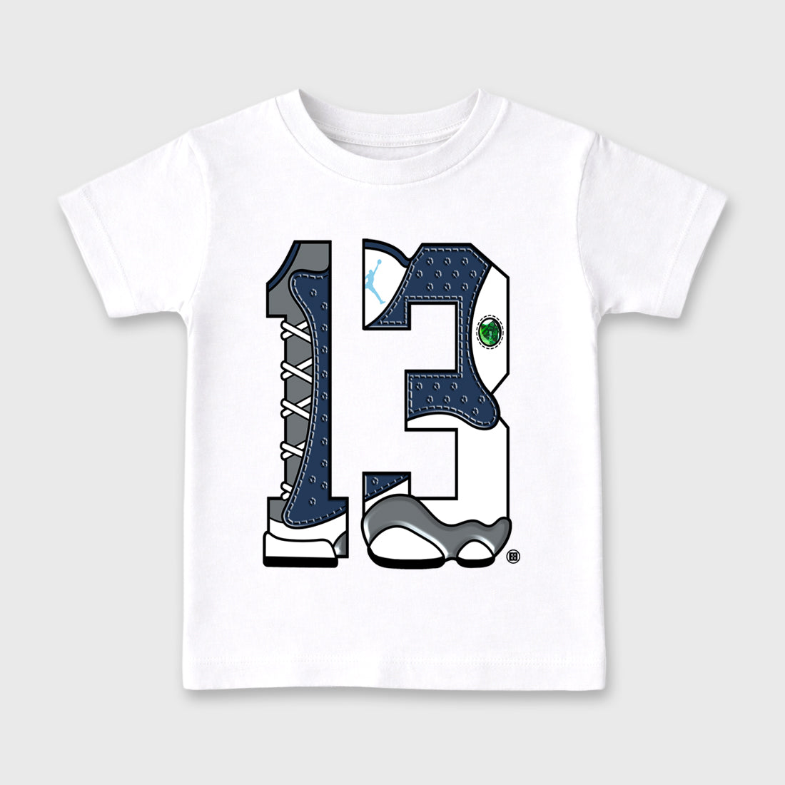 Number 13 Baby & Kids Graphic T-Shirt featuring original artwork designed to match the Air Jordan 13 Flint. White 2 Kids Graphic Tee.