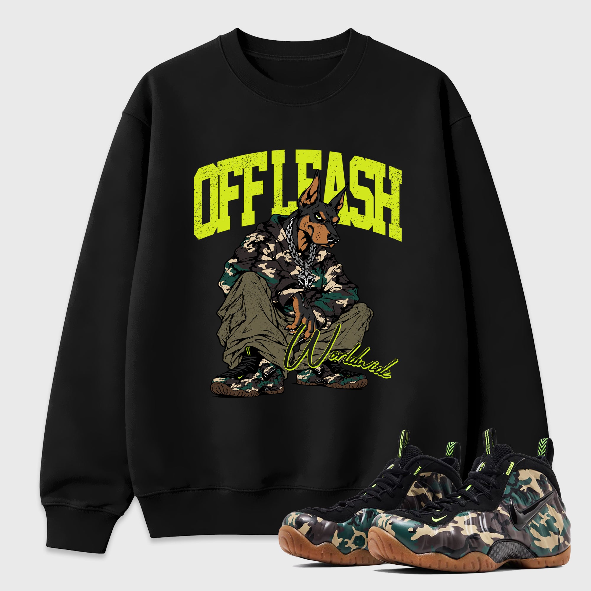 Off Leash Graphic T-Shirt featuring original streetwear artwork designed to match the Air Foamposite Pro Green Camo. Black 1 Graphic Tee.