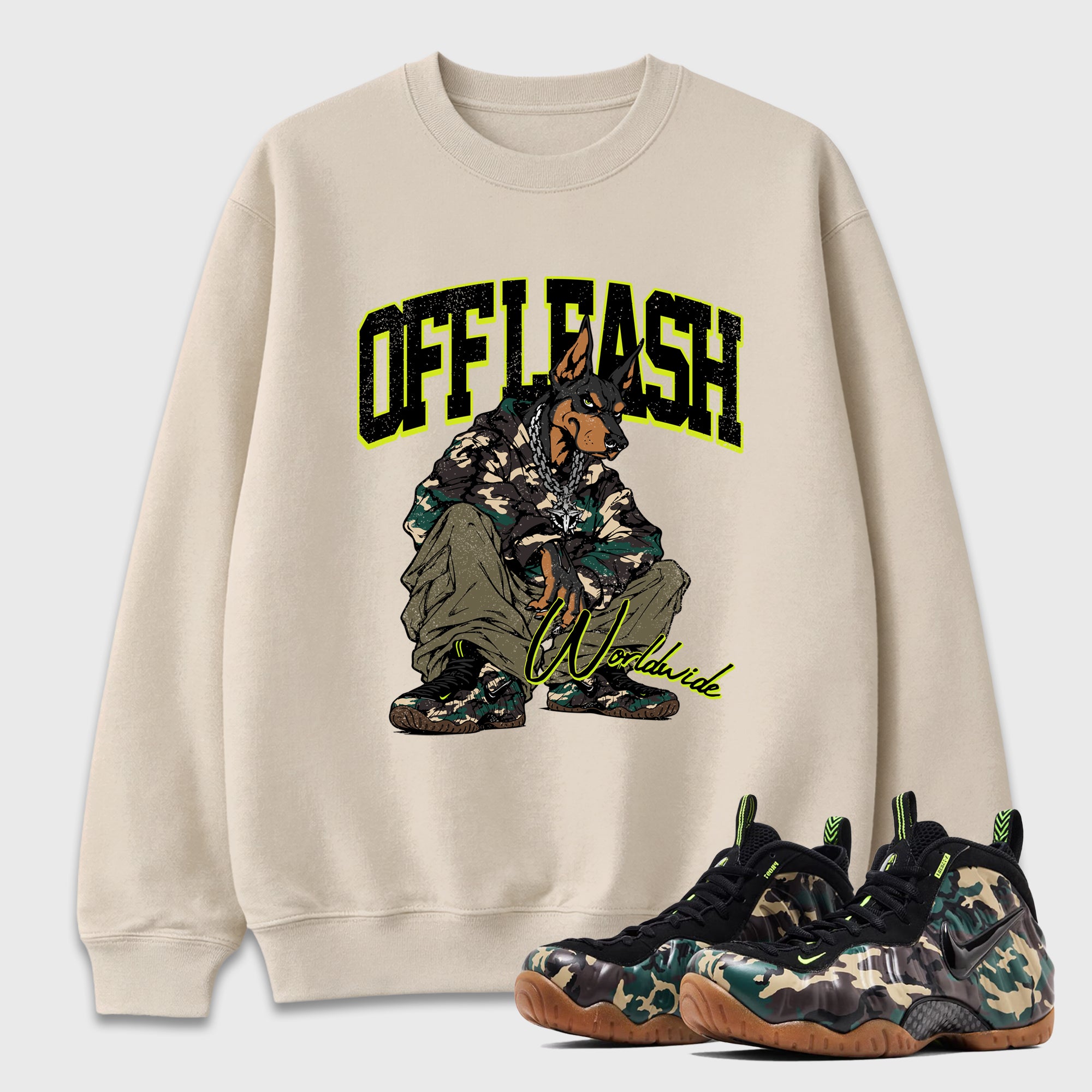 Off Leash Graphic T-Shirt featuring original streetwear artwork designed to match the Air Foamposite Pro Green Camo. Natural 1 Graphic Tee.