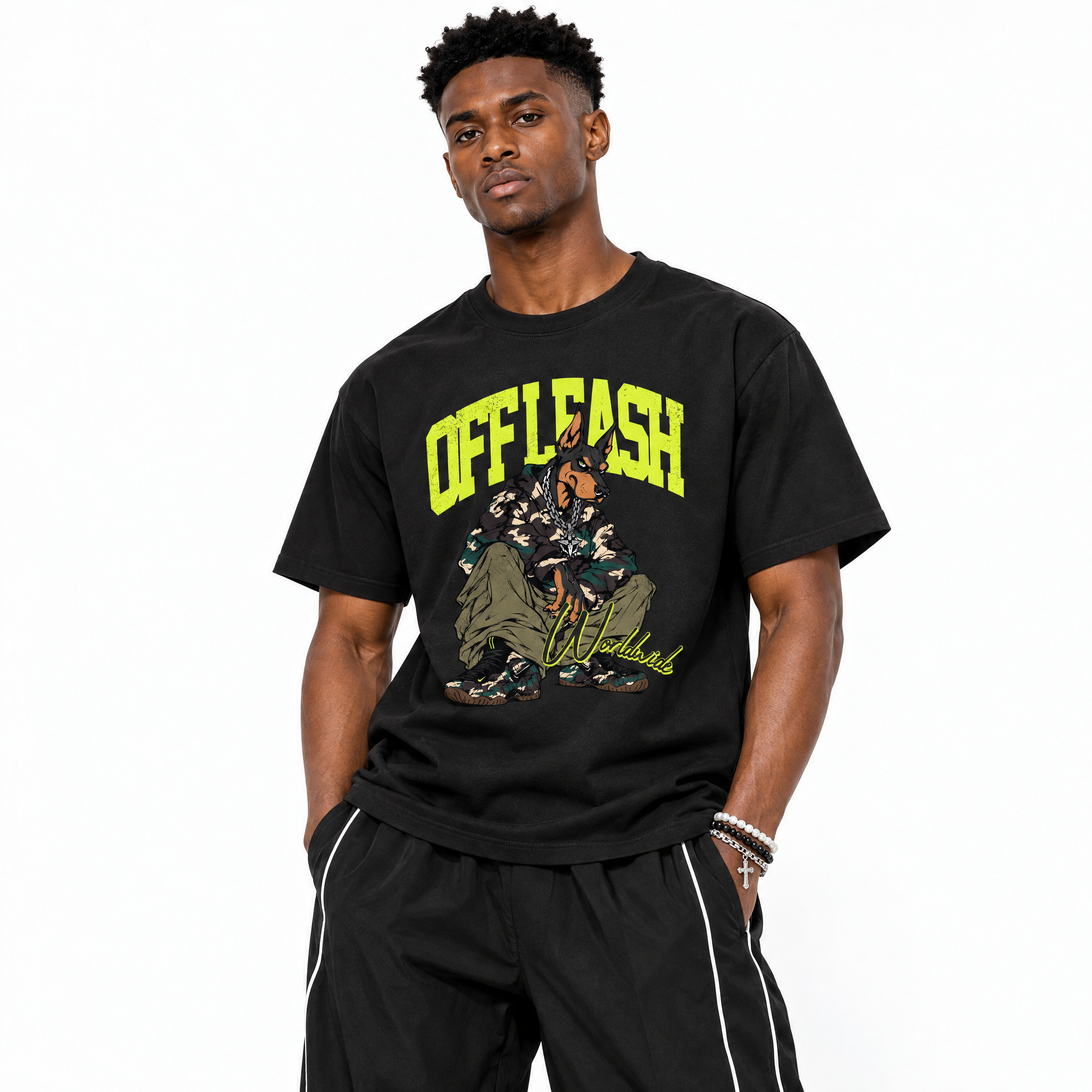 Off Leash Graphic T-Shirt featuring original streetwear artwork designed to match the Air Foamposite Pro Green Camo. Black 1 Graphic T-Shirt.