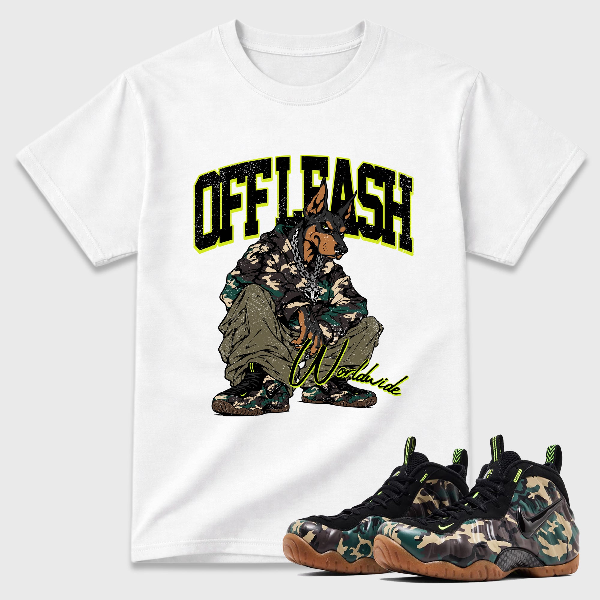 Off Leash Graphic T-Shirt featuring original streetwear artwork designed to match the Air Foamposite Pro Green Camo. White 1 Graphic T-Shirt.