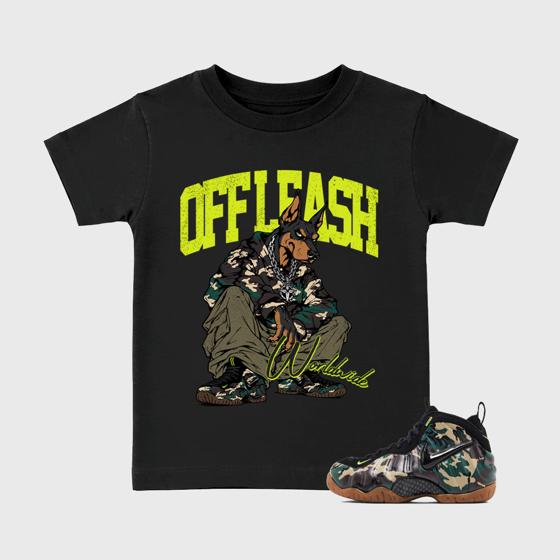 Off Leash Baby & Kids Graphic T-Shirt featuring original artwork designed to match the Air Foamposite Pro Green Camo. Black 1 Kids Graphic Tee.