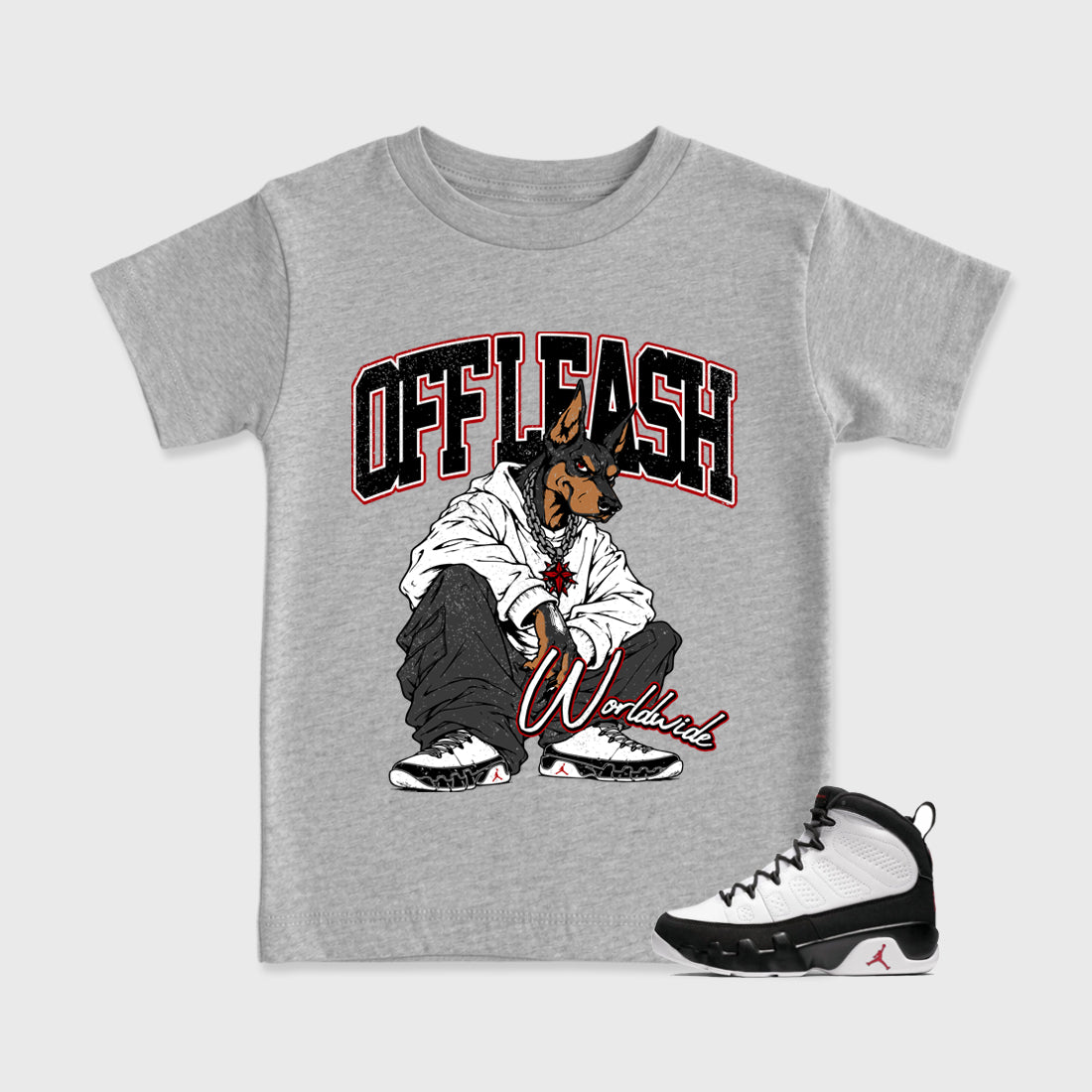 Off Leash Baby & Kids Graphic T-Shirt featuring original artwork designed to match the Air Jordan 9 True Red. Heather Grey 1 Kids Graphic Tee.