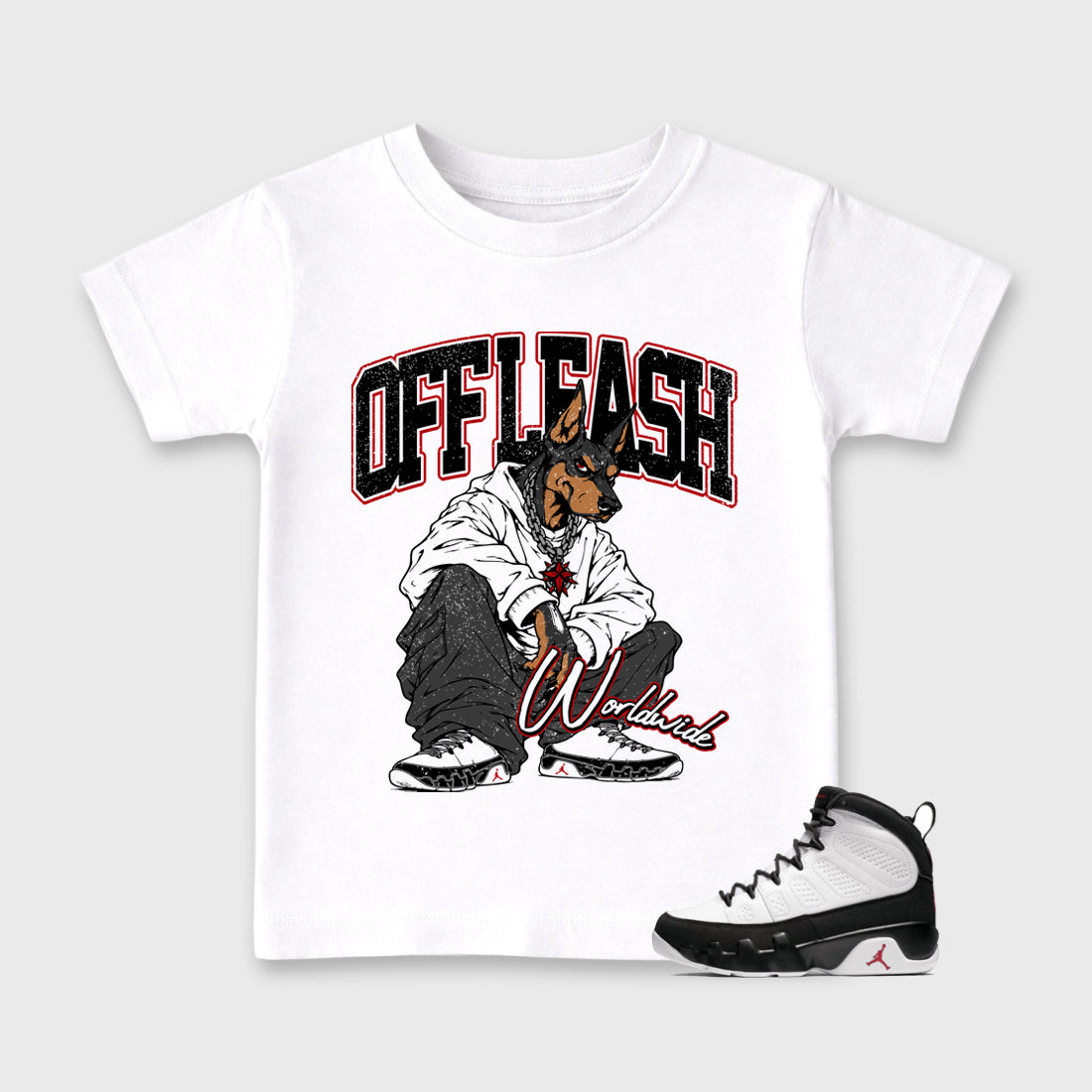 Off Leash Baby & Kids Graphic T-Shirt featuring original artwork designed to match the Air Jordan 9 True Red. White 1 Kids Graphic Tee.