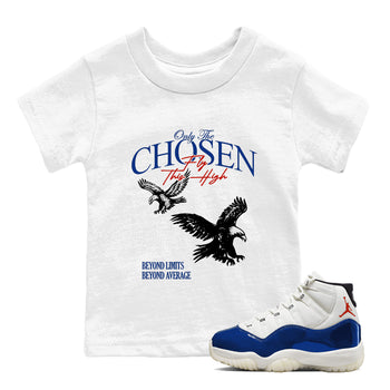 White t-shirt with eagle design and text, paired with a white and blue sneaker.
