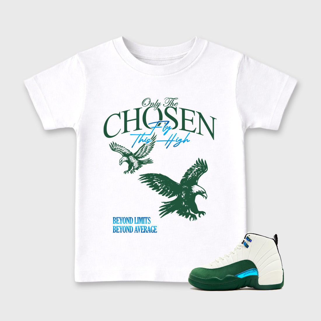 Only The Chosen Fly This High Baby & Kids Graphic T-Shirt featuring original artwork designed to match the Air Jordan 12 Summit Green. White 1 Kids Graphic Tee.
