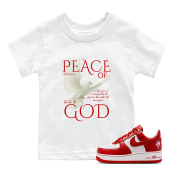 Peace of God baby and kids t-shirt crafted for little sneakerheads to shine with the Air Force 1 University Red sneakers, displayed in White 1.