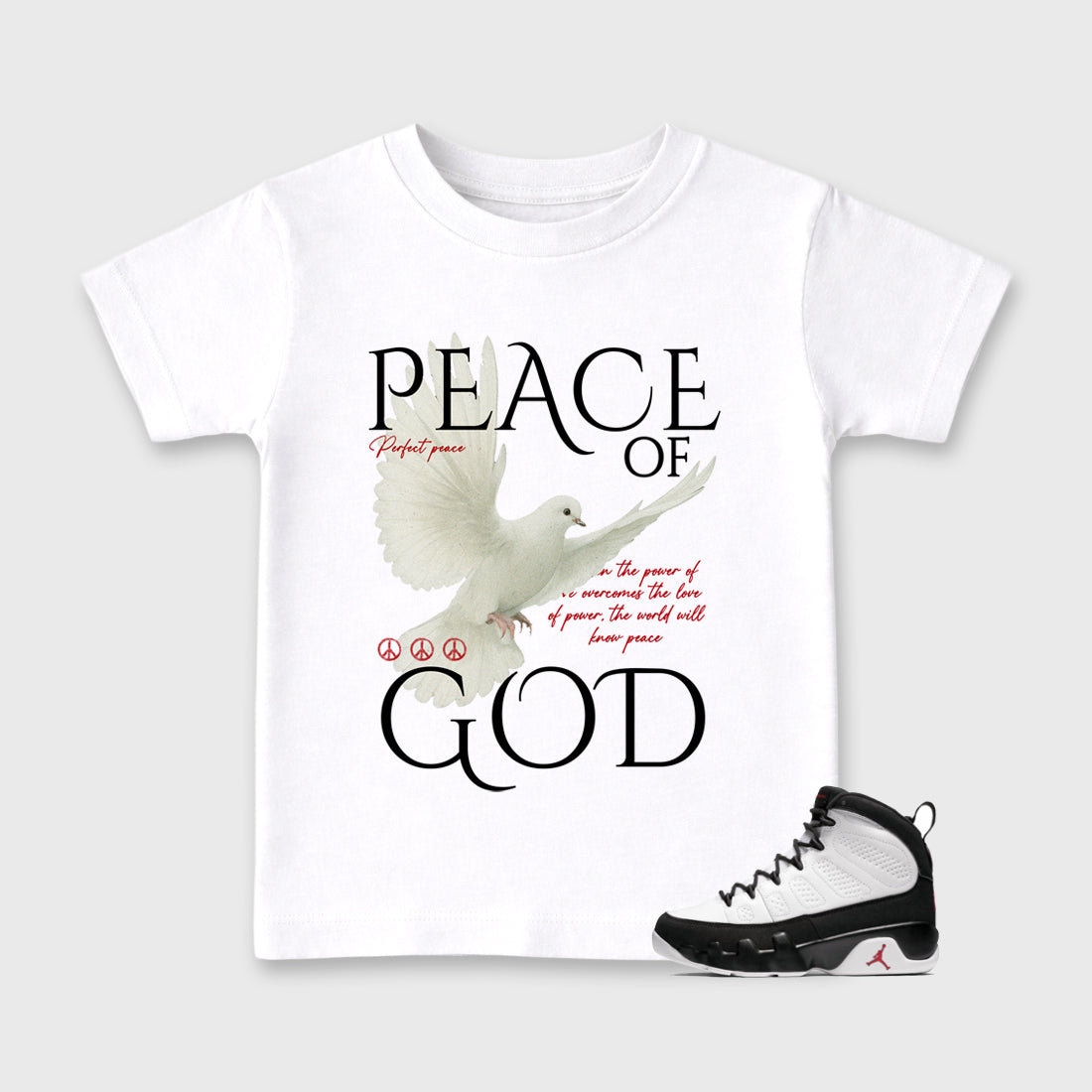 Peace of God Baby & Kids Graphic T-Shirt featuring original artwork designed to match the Air Jordan 9 True Red. White 1 Kids Graphic Tee.