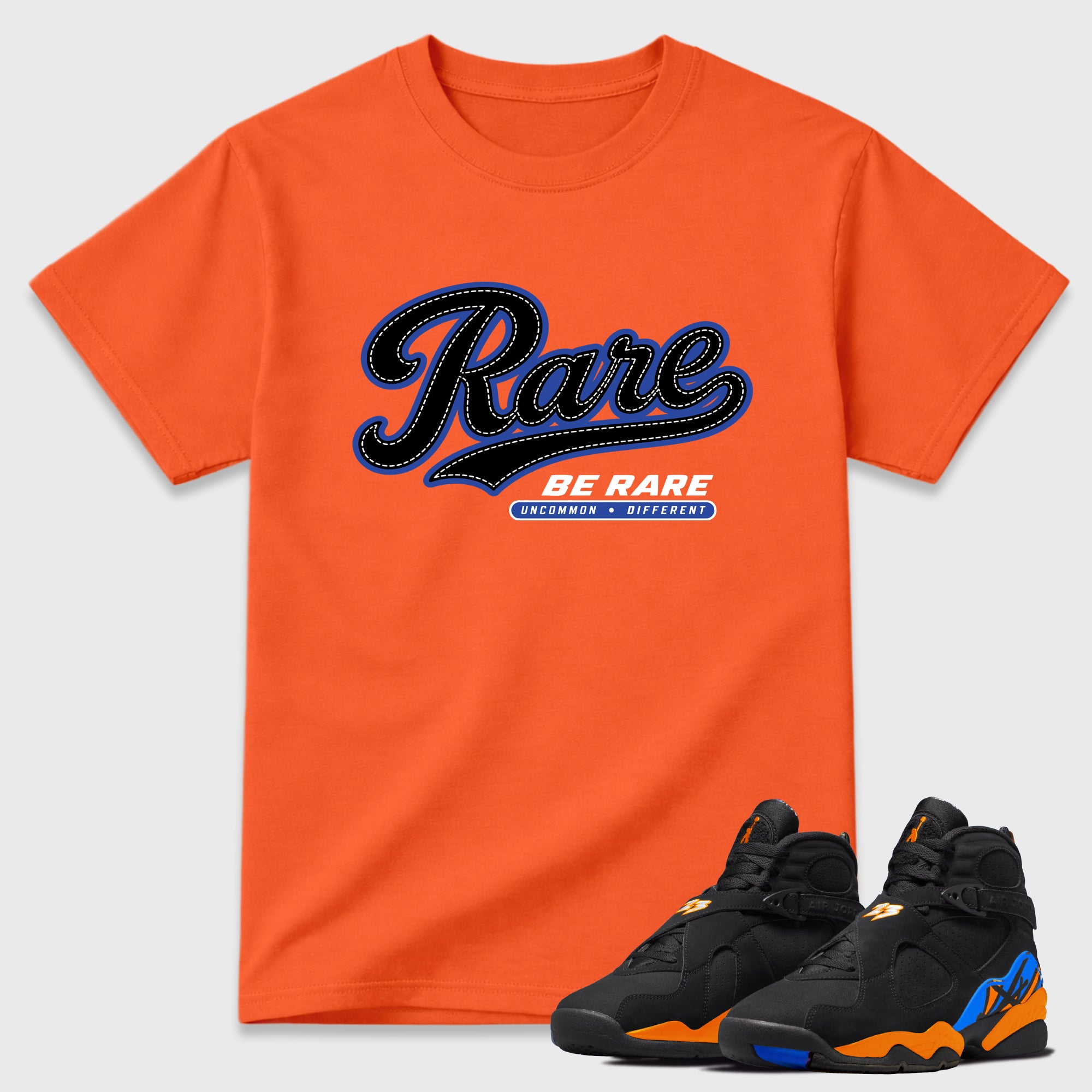 Rare Graphic T-Shirt featuring original streetwear artwork designed to match the Air Jordan 8 Knicks. Orange 1 Graphic T-Shirt.