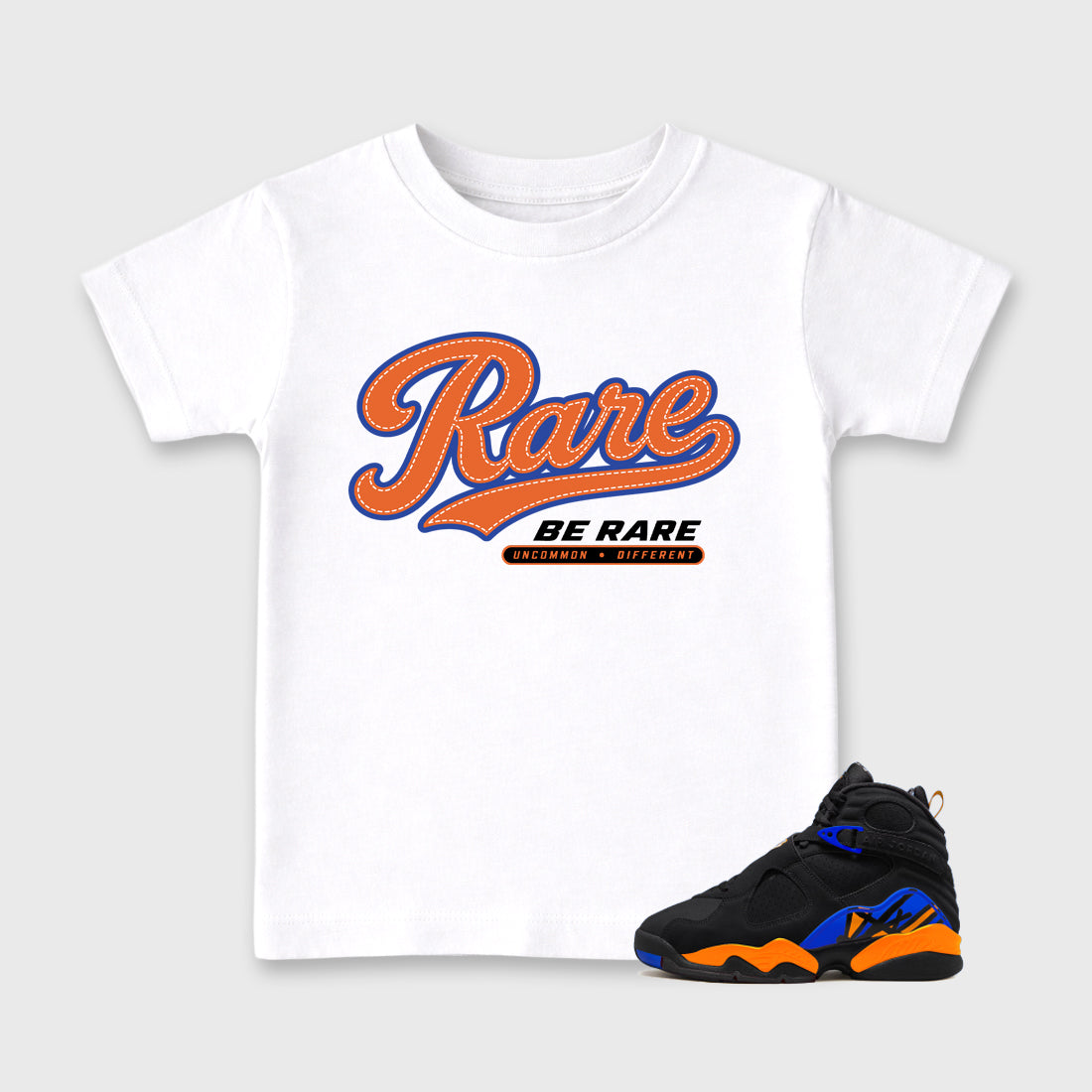 Rare Baby & Kids Graphic T-Shirt featuring original artwork designed to match the Air Jordan 8 Knicks. White 1 Kids Graphic Tee.