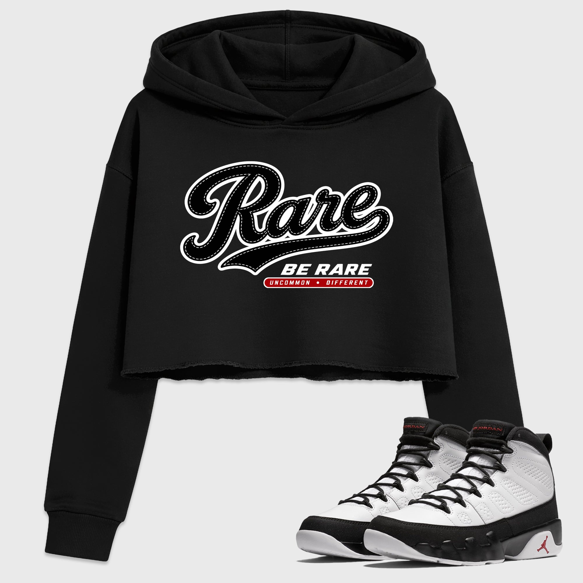 Rare Women’s Graphic Crop Tee featuring original streetwear artwork designed to match the Air Jordan 9 True Red. Black 1 Crop Tee.