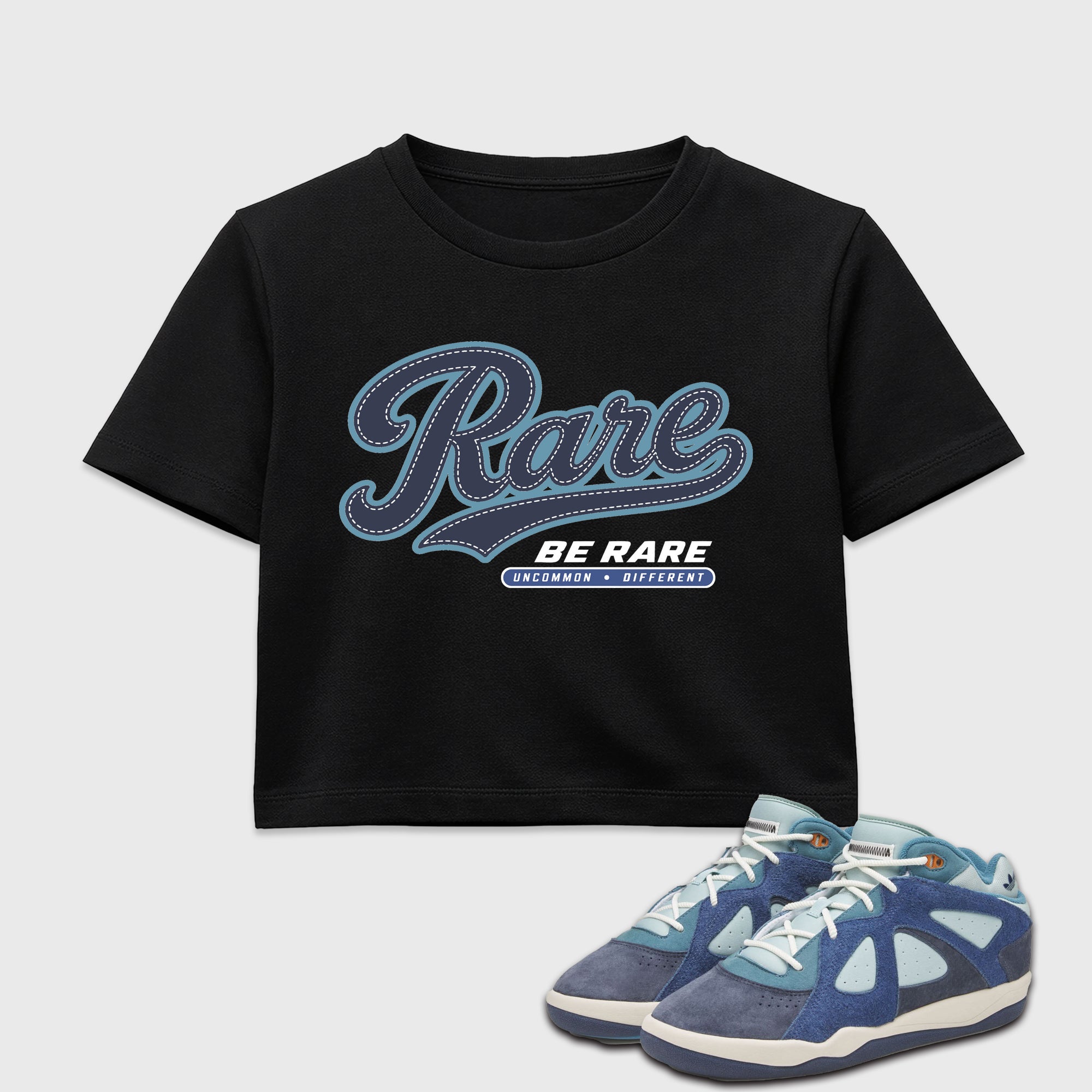 Rare women’s crop tee designed to match the Badbo 1.0 Night Navy, featuring coordinated Black 1 options for a perfect streetwear vibe.