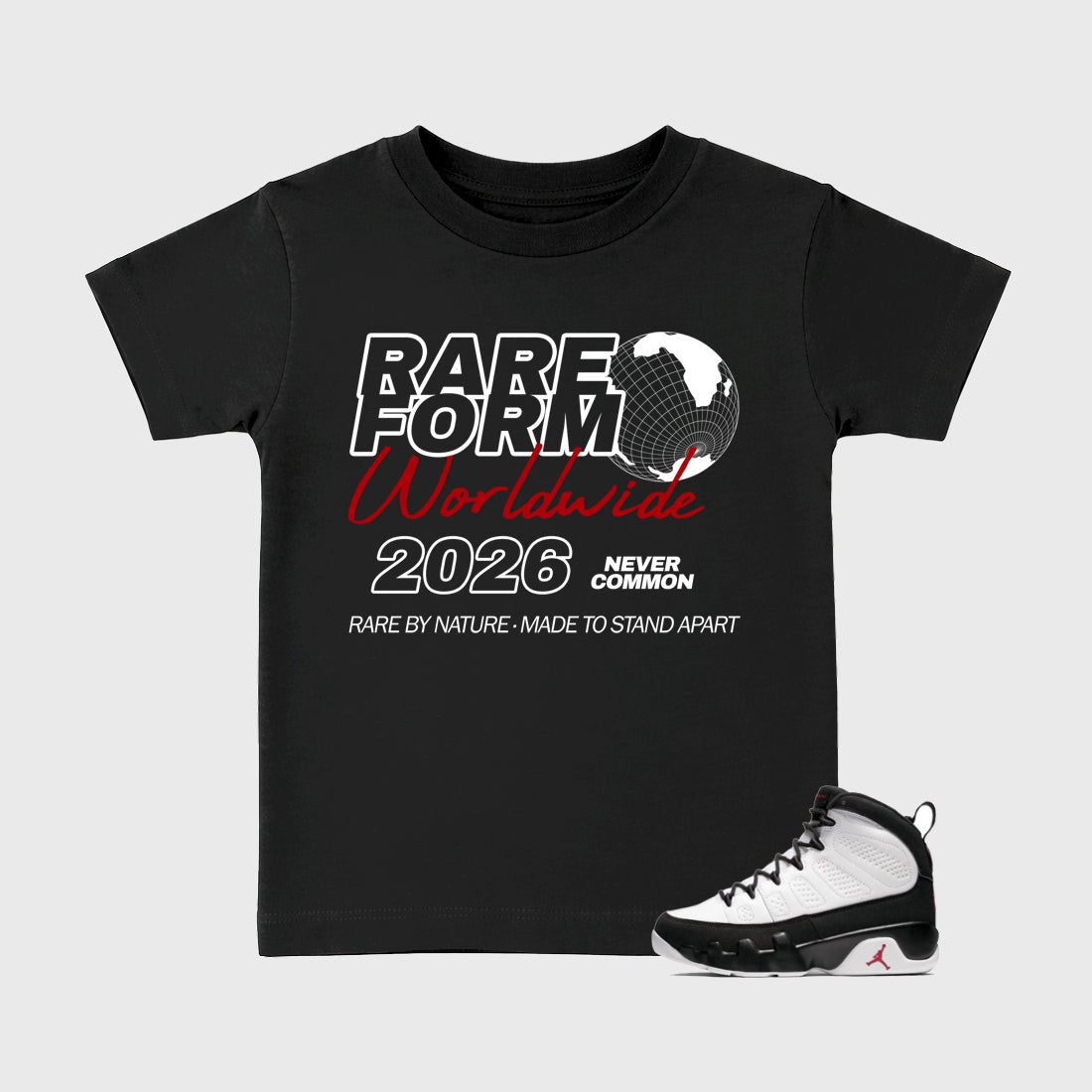 Rare Form Baby & Kids Graphic T-Shirt featuring original artwork designed to match the Air Jordan 9 True Red. Black 1 Kids Graphic Tee.