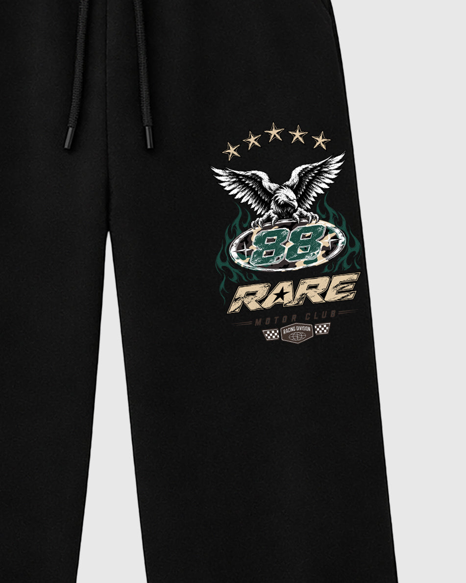 Rare Motor Club graphic wide cut sweatpants designed to match the Air Foamposite Pro Green Camo, featuring coordinated Black 2 options for a perfect streetwear vibe.