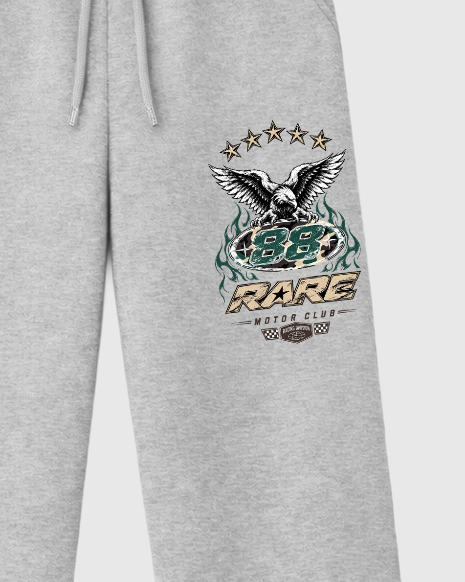 Rare Motor Club graphic wide cut sweatpants designed to match the Air Foamposite Pro Green Camo, featuring coordinated Heather Grey 2 options for a perfect streetwear vibe.