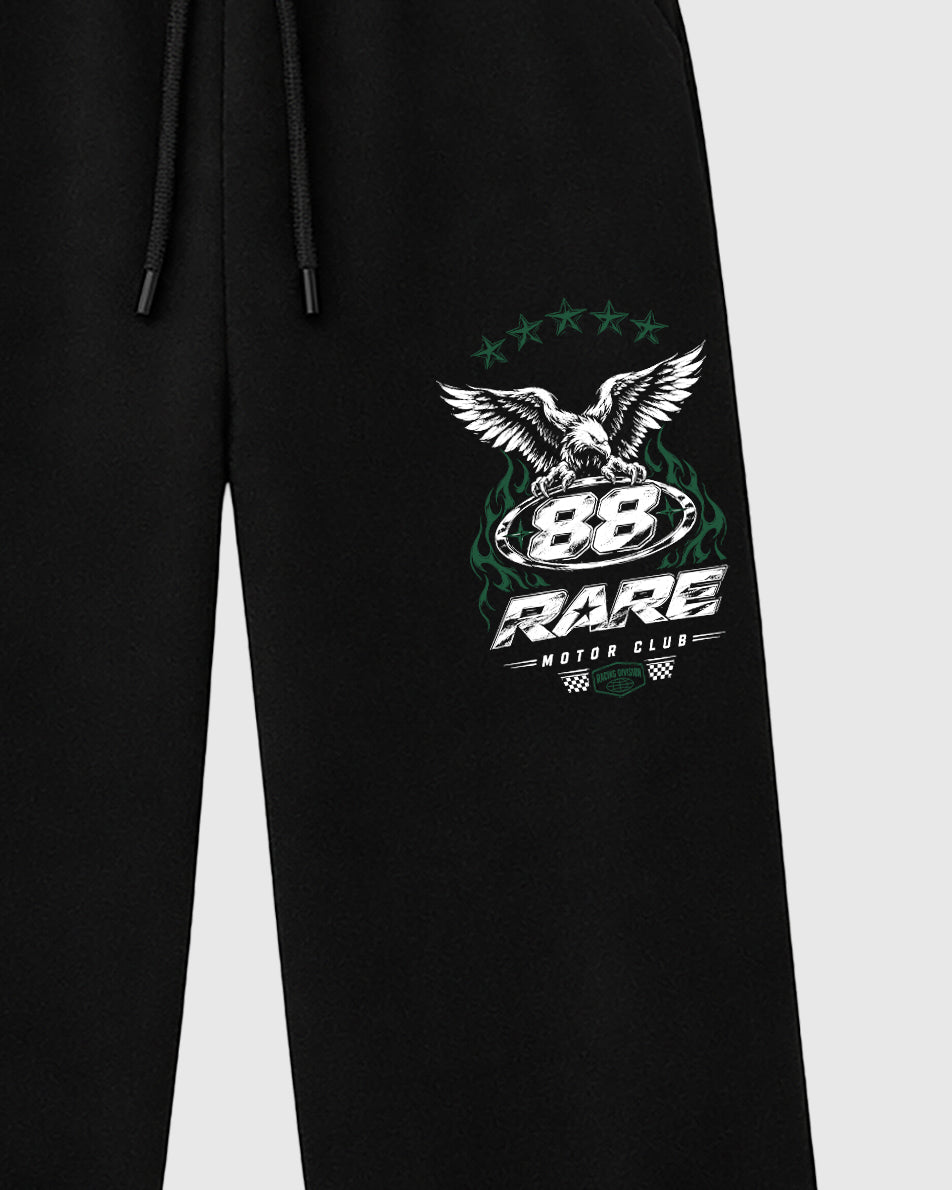 Rare Motor Club graphic wide cut sweatpants designed to match the Air Jordan 12 Retro Bucks, featuring coordinated Black 2 options for a perfect streetwear vibe.