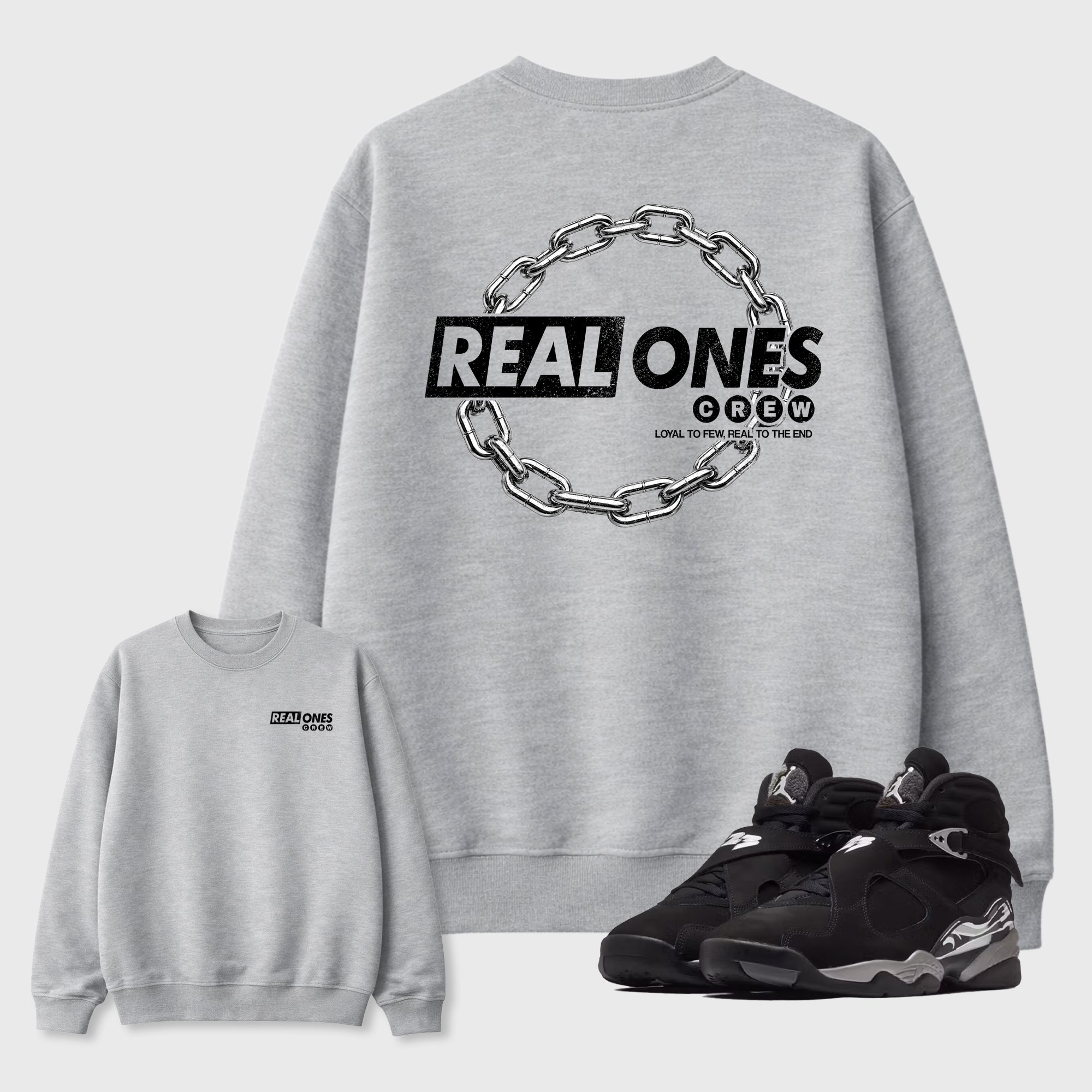 Real Ones Crew Graphic T-Shirt featuring original streetwear artwork designed to complement the black, graphite, and silver-grey tones of the Air Jordan 8 Chrome. Heather Grey Graphic Tee.
