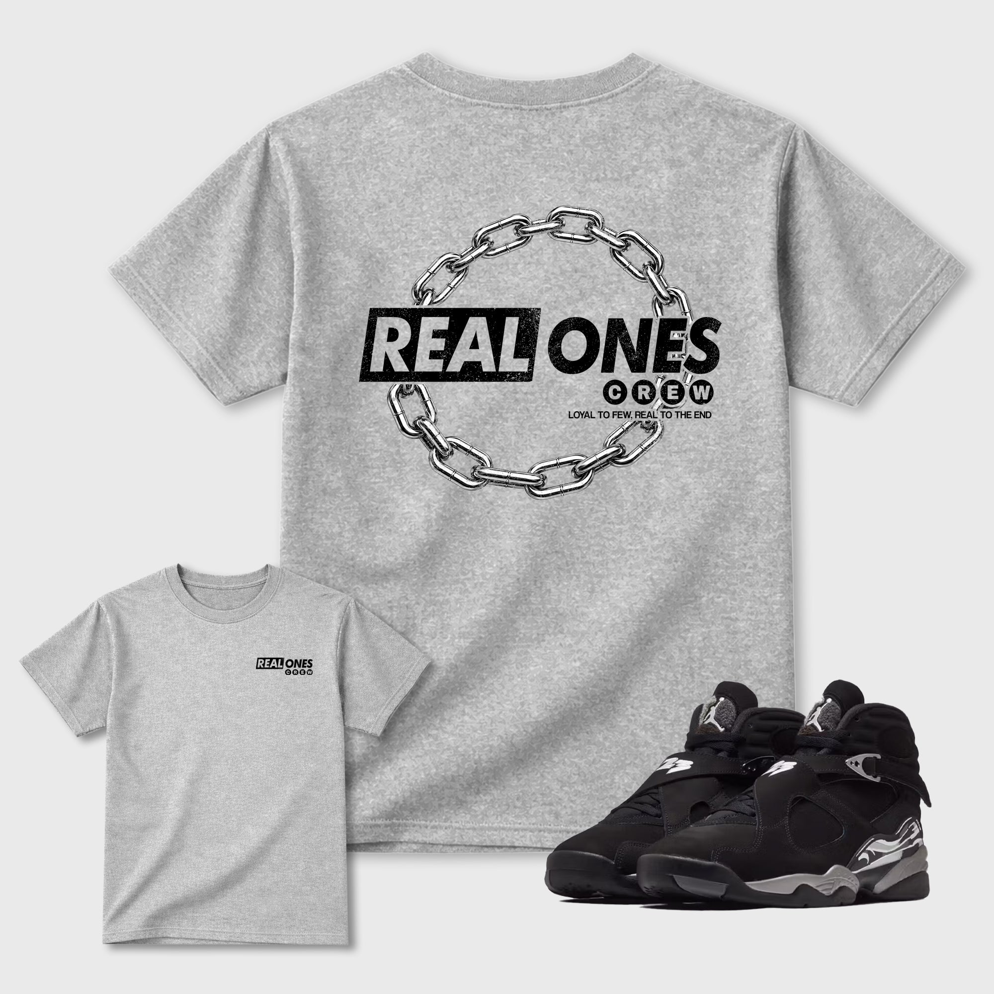 Real Ones Crew Graphic T-Shirt featuring original streetwear artwork designed to complement the black, graphite, and silver-grey tones of the Jordan 8 Chrome. Heather Grey Graphic T-Shirt.