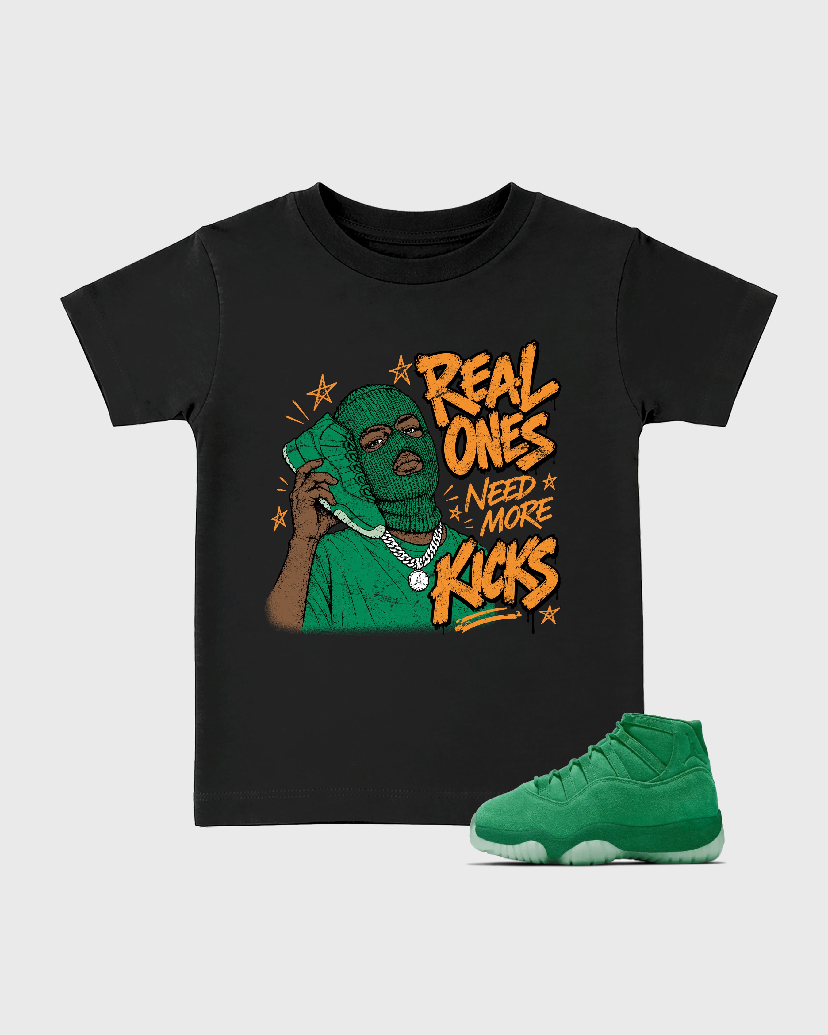 Real Ones Need More Kicks Baby & Kids Graphic T-Shirt featuring original artwork designed to match the Air Jordan 11 Green Screen. Black 1 Kids Graphic Tee.