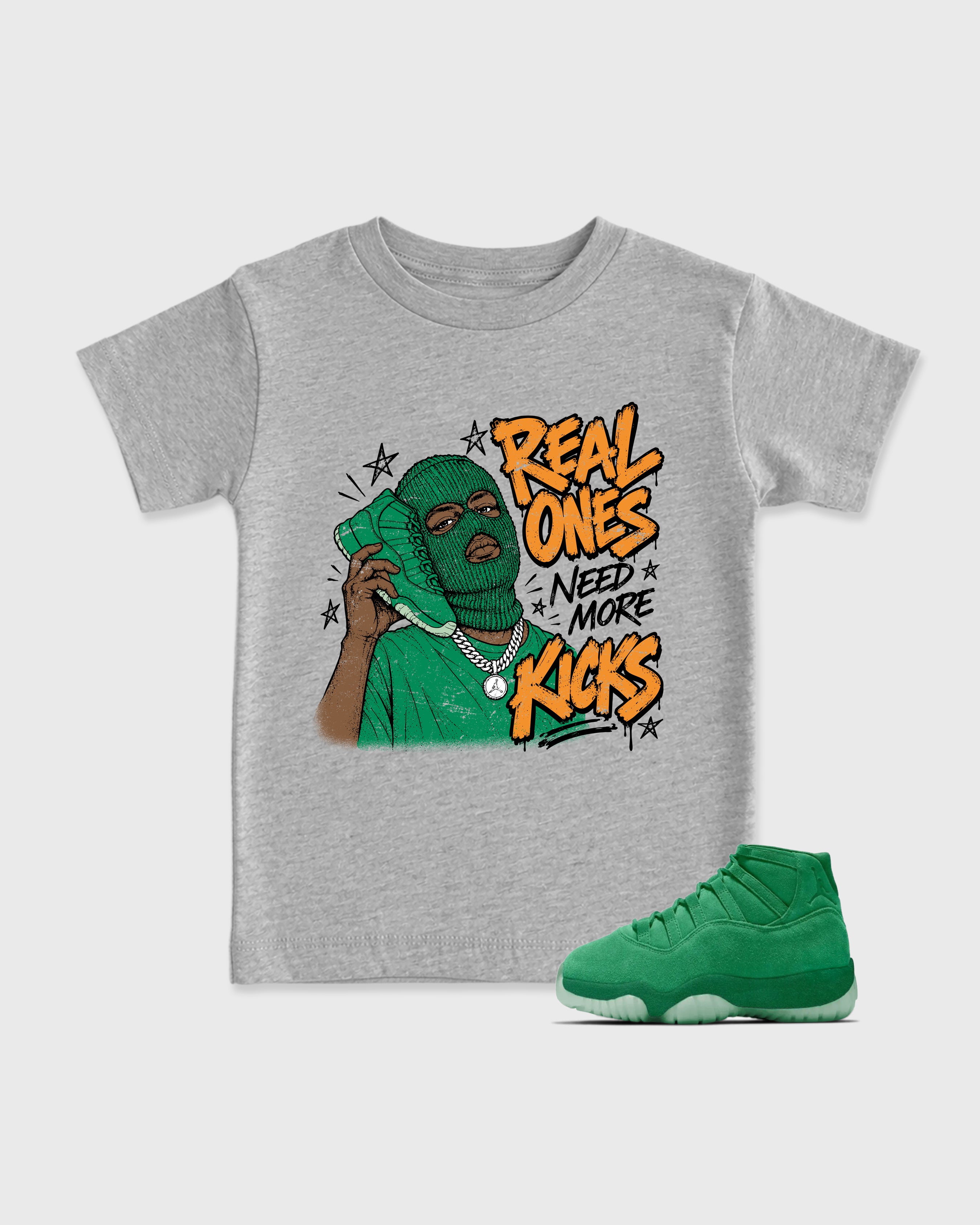 Real Ones Need More Kicks Baby & Kids Graphic T-Shirt featuring original artwork designed to match the Air Jordan 11 Green Screen. Heather Grey 1 Kids Graphic Tee.