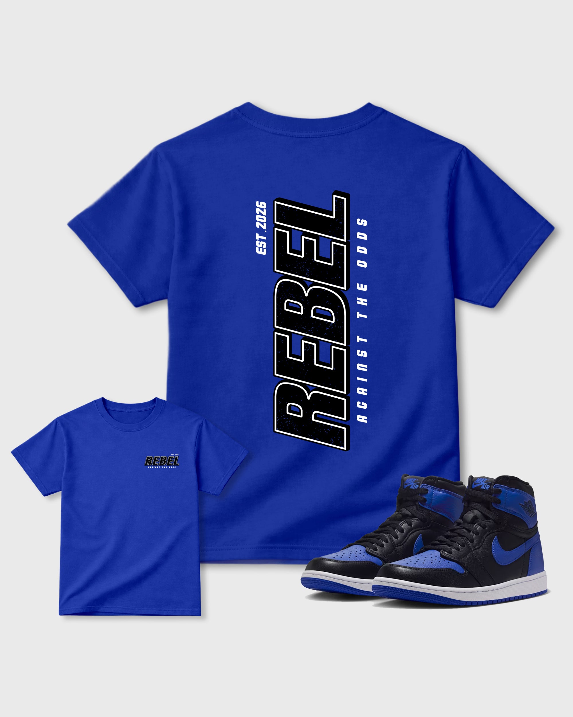 Rebel Royal Blue Graphic T-Shirt - 3, sneaker matching shirt designed to pair with Air Jordan 1 High OG 'Royal' sneakers for a coordinated streetwear outfit.