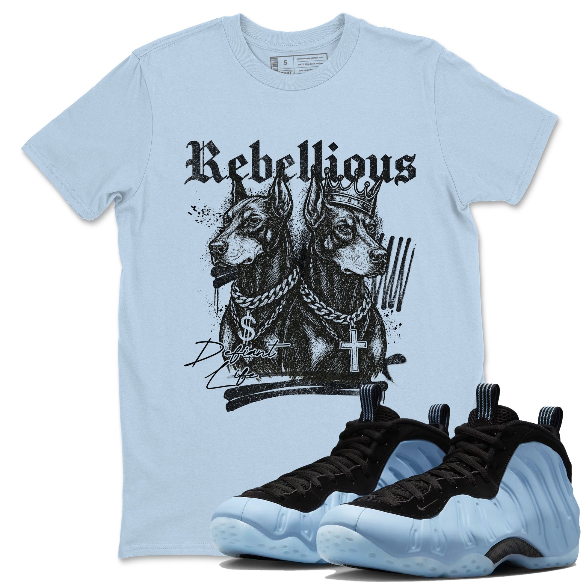 Rebellious sneaker match t-shirt styled to complete your fit with the Air Foamposite One Psychic Blue sneakers, shown in Light Blue 1.