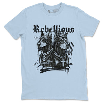 Rebellious sneaker match t-shirt styled to complete your fit with the Air Foamposite One Psychic Blue sneakers, shown in Light Blue 2.