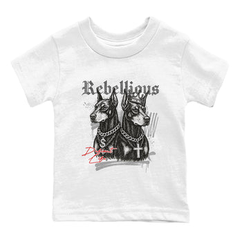 Rebellious baby and kids t-shirt crafted for little sneakerheads to shine with the Air Jordan 4 White Cement sneakers, displayed in White 2.