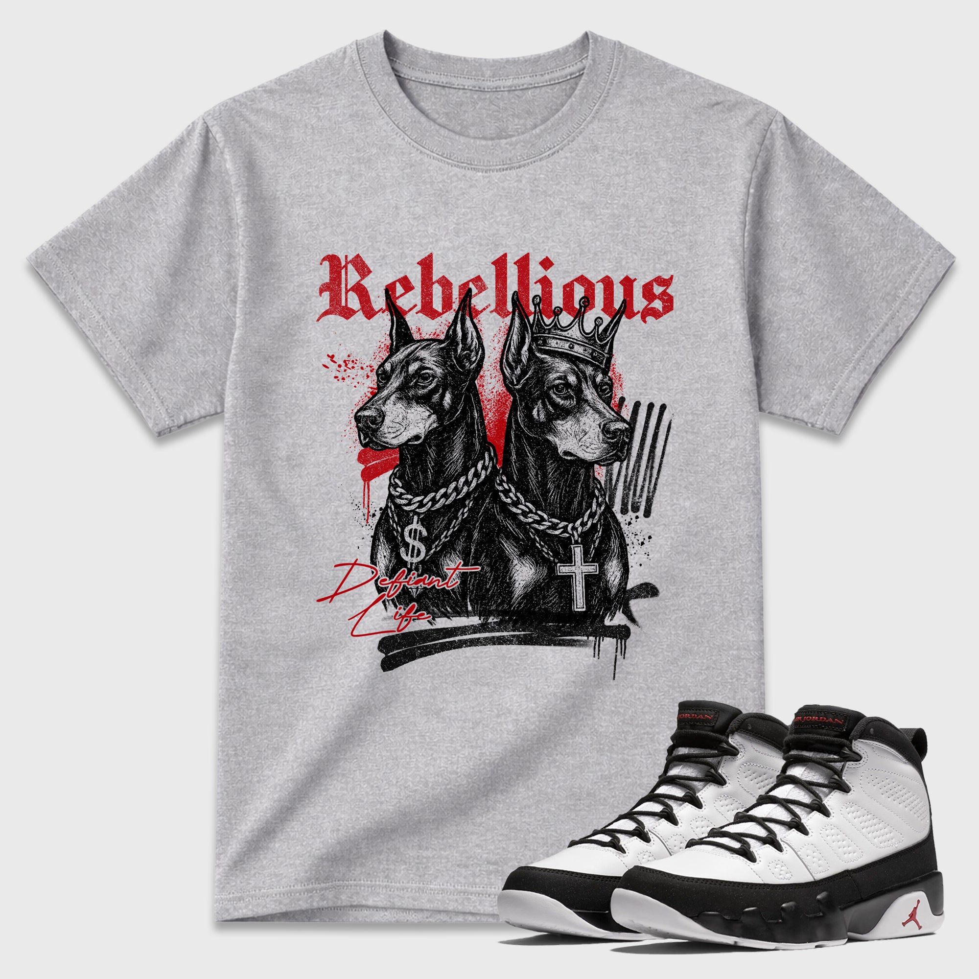 Rebellious Graphic T-Shirt featuring original streetwear artwork designed to match the Air Jordan 9 True Red. Heather Grey 1 Graphic T-Shirt.