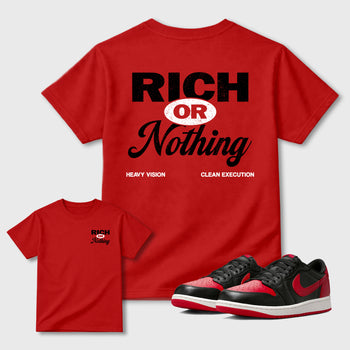 Rich Or Nothing graphic t-shirt styled to complete your sneaker outfit with the 1s Low OG Banned, shown in Red.