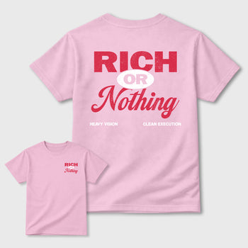 Rich Or Nothing graphic t-shirt styled to complete your sneaker outfit with the Air Jordan 1 Low x Travis Scott Tropical Pink, shown in Pink.