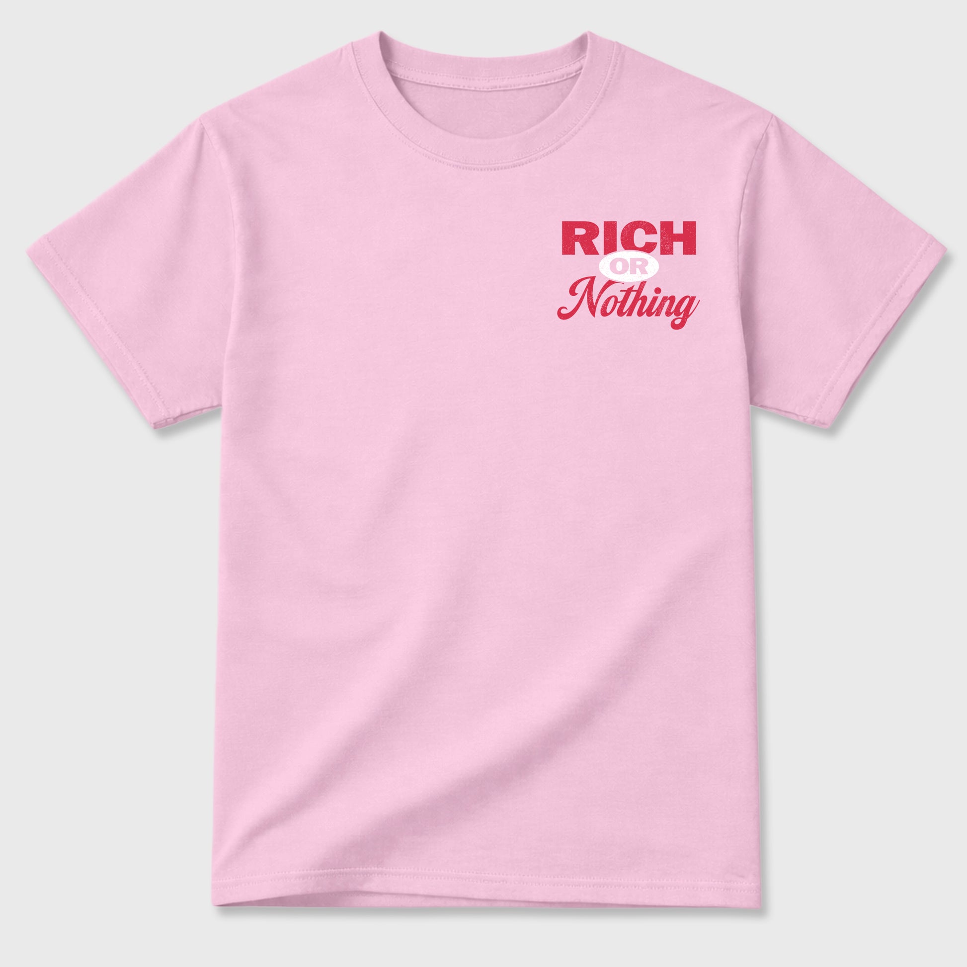 Rich Or Nothing graphic t-shirt styled to complete your sneaker outfit with the Air Jordan 1 Low x Travis Scott Tropical Pink, shown in Pink.