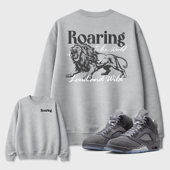 Roaring To the World sneaker match t-shirt styled to complete your fit with the Air Jordan 5 Wolf Grey sneakers, shown in Heather Grey.