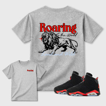 Roaring To the World sneaker match t-shirt styled to complete your fit with the Air Jordan 6 Retro Reverse Infrared sneakers, shown in Heather Grey.