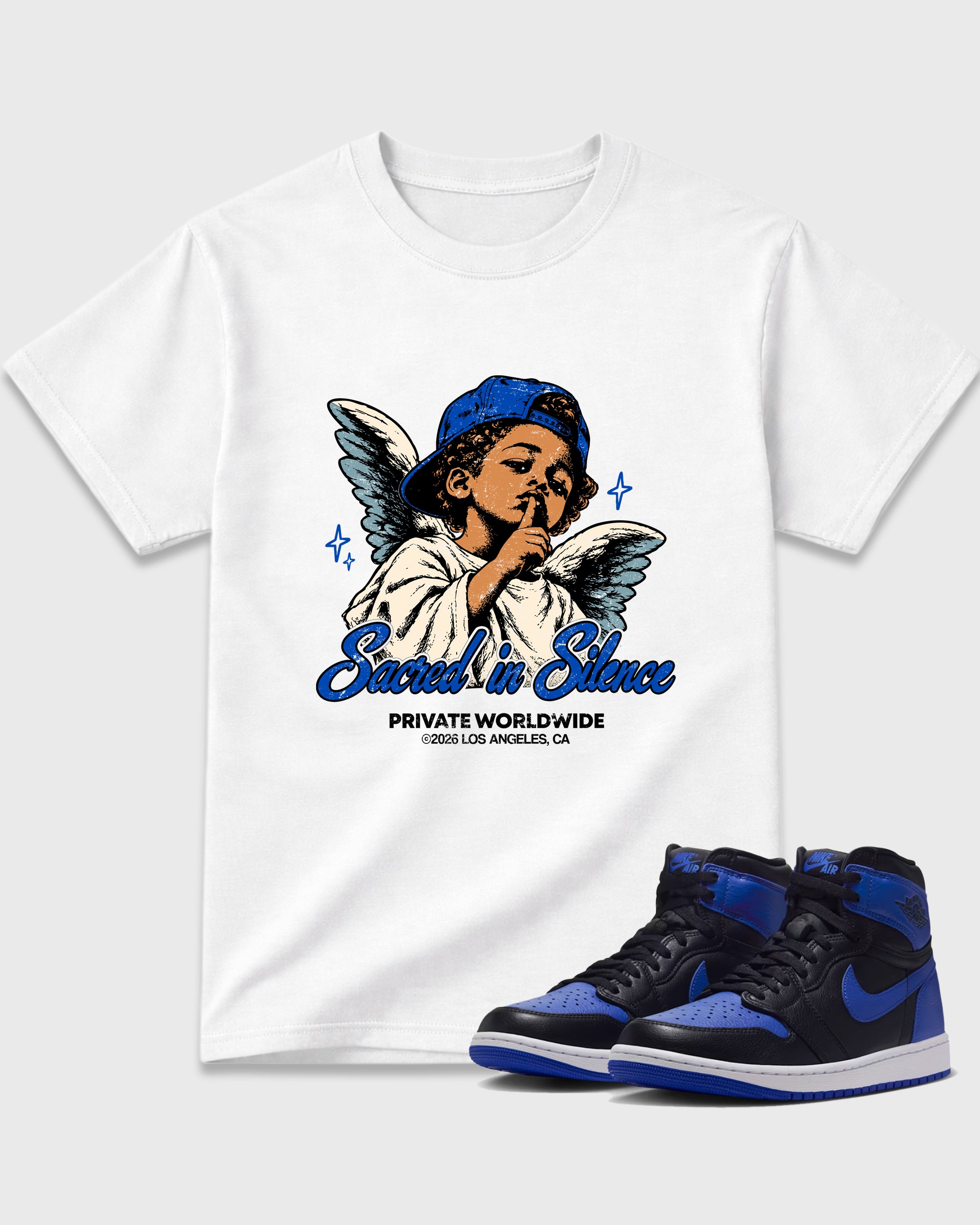 Sacred In Silence Graphic T-Shirt featuring original streetwear artwork designed to match the Air Jordan 1 High OG 'Royal'. White 1 Graphic T-Shirt.
