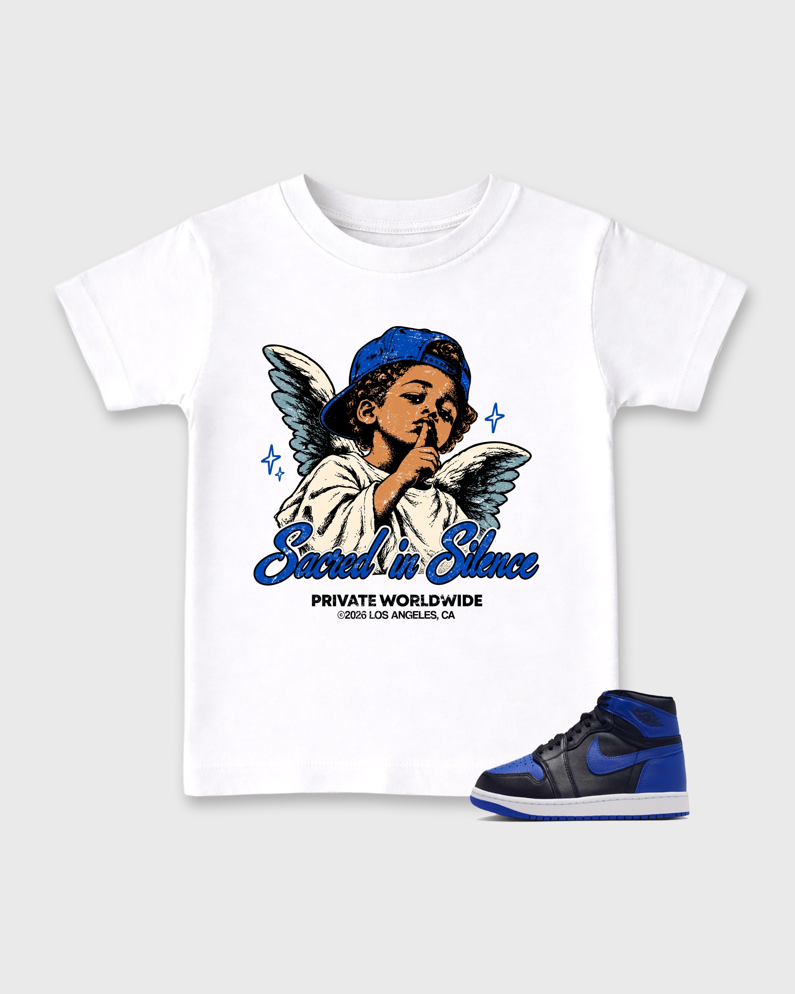 Sacred In Silence Baby & Kids Graphic T-Shirt featuring original artwork designed to match the Air Jordan 1 High OG 'Royal'. White 1 Kids Graphic Tee.