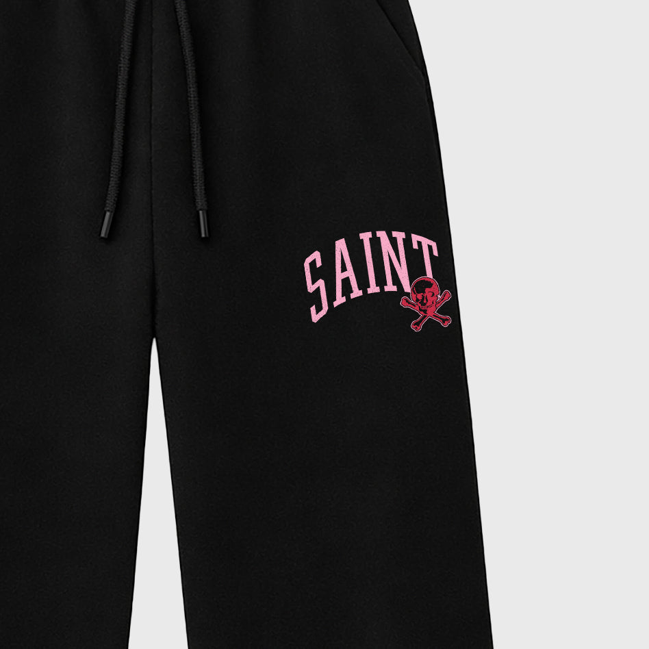 Saint Bones graphic wide cut sweatpants designed to match the Jordan 1 Low x Travis Scott Tropical Pink, featuring coordinated Black 2 options for a perfect streetwear vibe.