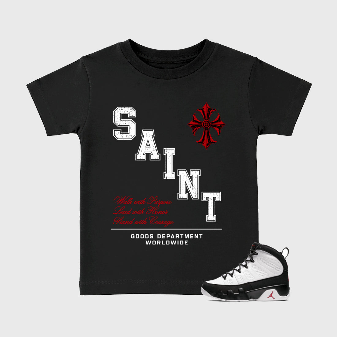 Saint Division Baby & Kids Graphic T-Shirt featuring original artwork designed to match the Air Jordan 9 True Red. Black 1 Kids Graphic Tee.