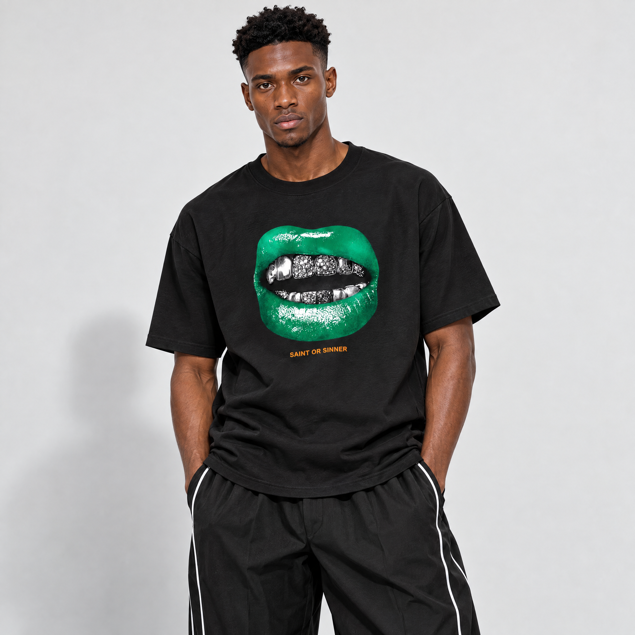 Saint or Sinner Graphic T-Shirt featuring original streetwear artwork designed to match the Air Jordan 11 Green Screen. Black 1 Graphic T-Shirt.