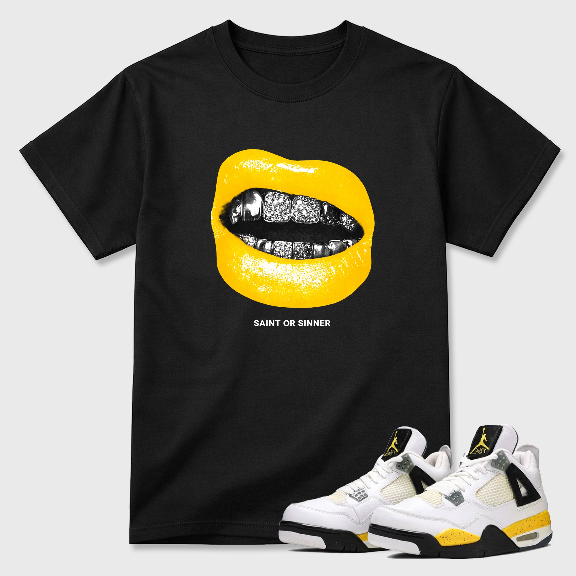 Saint or Sinner Graphic T-Shirt featuring original streetwear artwork designed to match the Air Jordan 4 Tour Yellow. Black 1 Graphic T-Shirt.