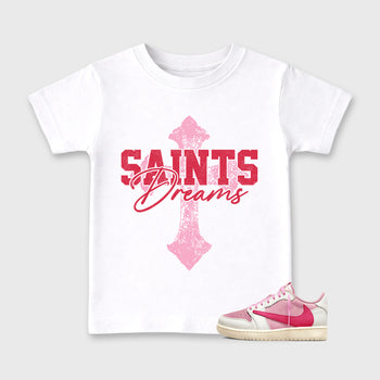Saints Dreams affordable baby and kids t-shirt designed to match the Air Jordan 1 Travis Scott Tropical Pink, featuring coordinated White 1 options for the perfect little sneakerhead streetwear look.