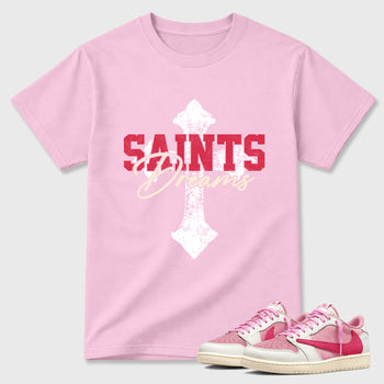 Saints Dreams Graphic T-Shirt sneaker match tee designed for the Air Jordan 1 Travis Scott Tropical Pink, featuring coordinated color options for a perfect streetwear match. Pink 1 shirt.