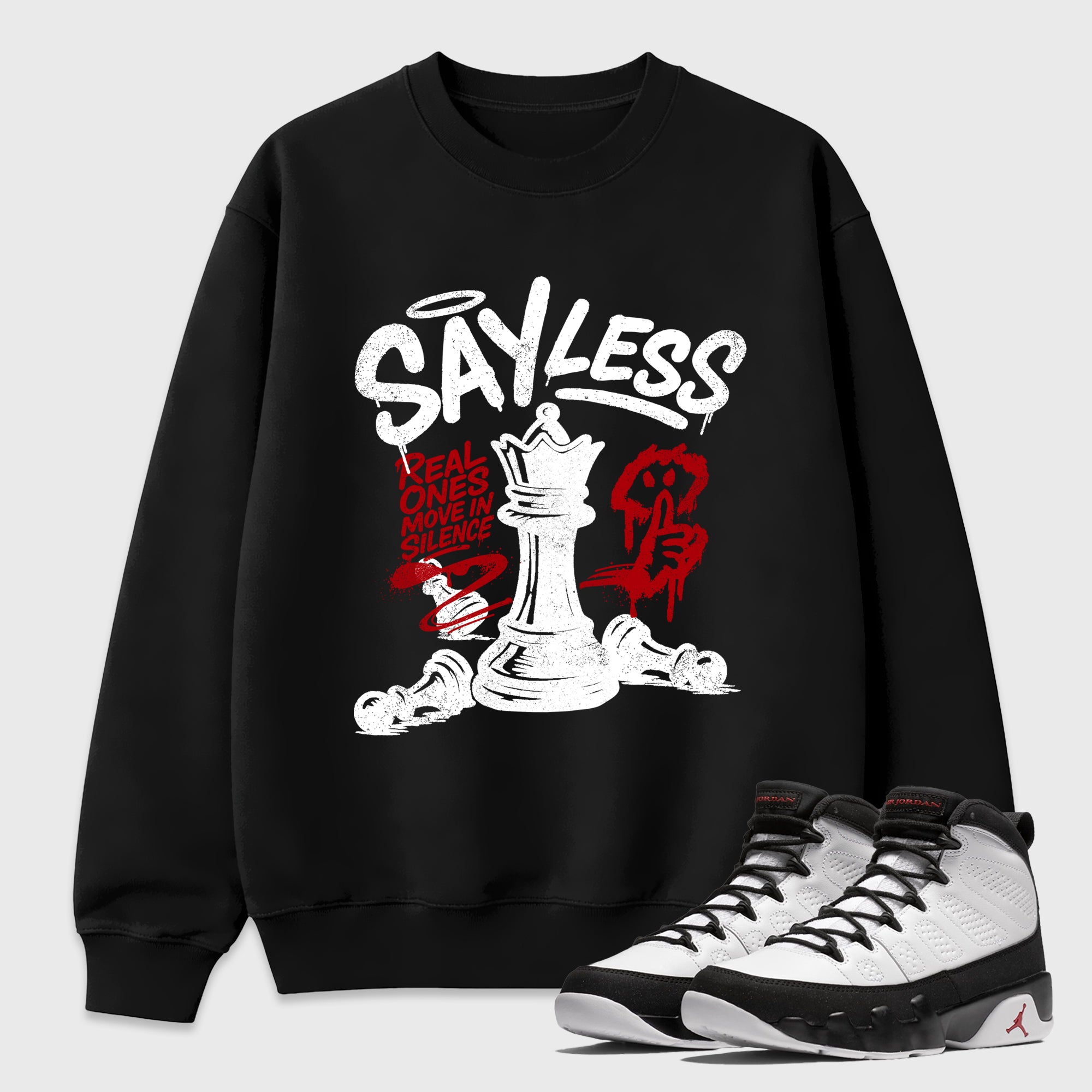 Say Less Graphic T-Shirt featuring original streetwear artwork designed to match the Air Jordan 9 True Red. Black 1 Graphic Tee.