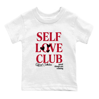 Self Love Club baby and kids t-shirt crafted for little sneakerheads to shine with the Air Jordan 1 Ruby sneakers, displayed in White 2.