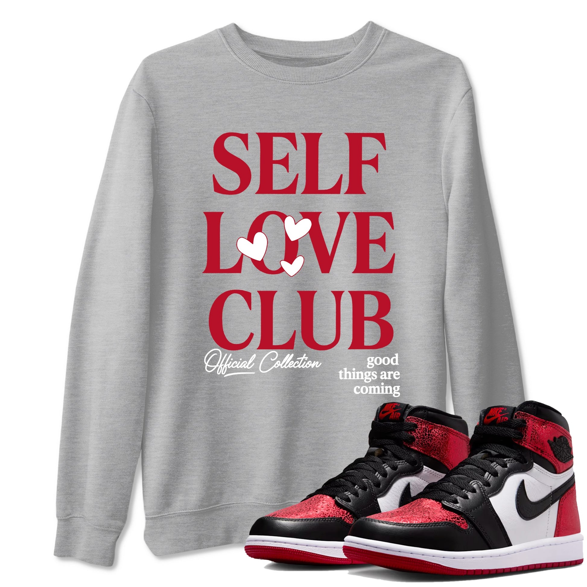 Self Love Club sneaker match t-shirt styled to complete your fit with the Air Jordan 1 Ruby sneakers, shown in Heather Grey 1.