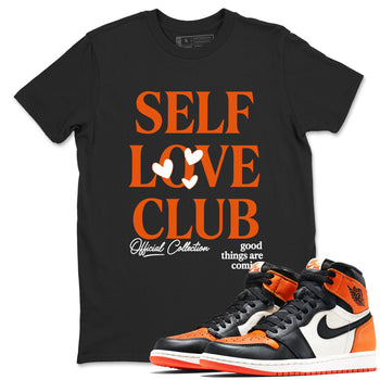 Self Love Club sneaker match t-shirt styled to complete your fit with the Air Jordan 1 Shattered Backboard sneakers, shown in Black 1.