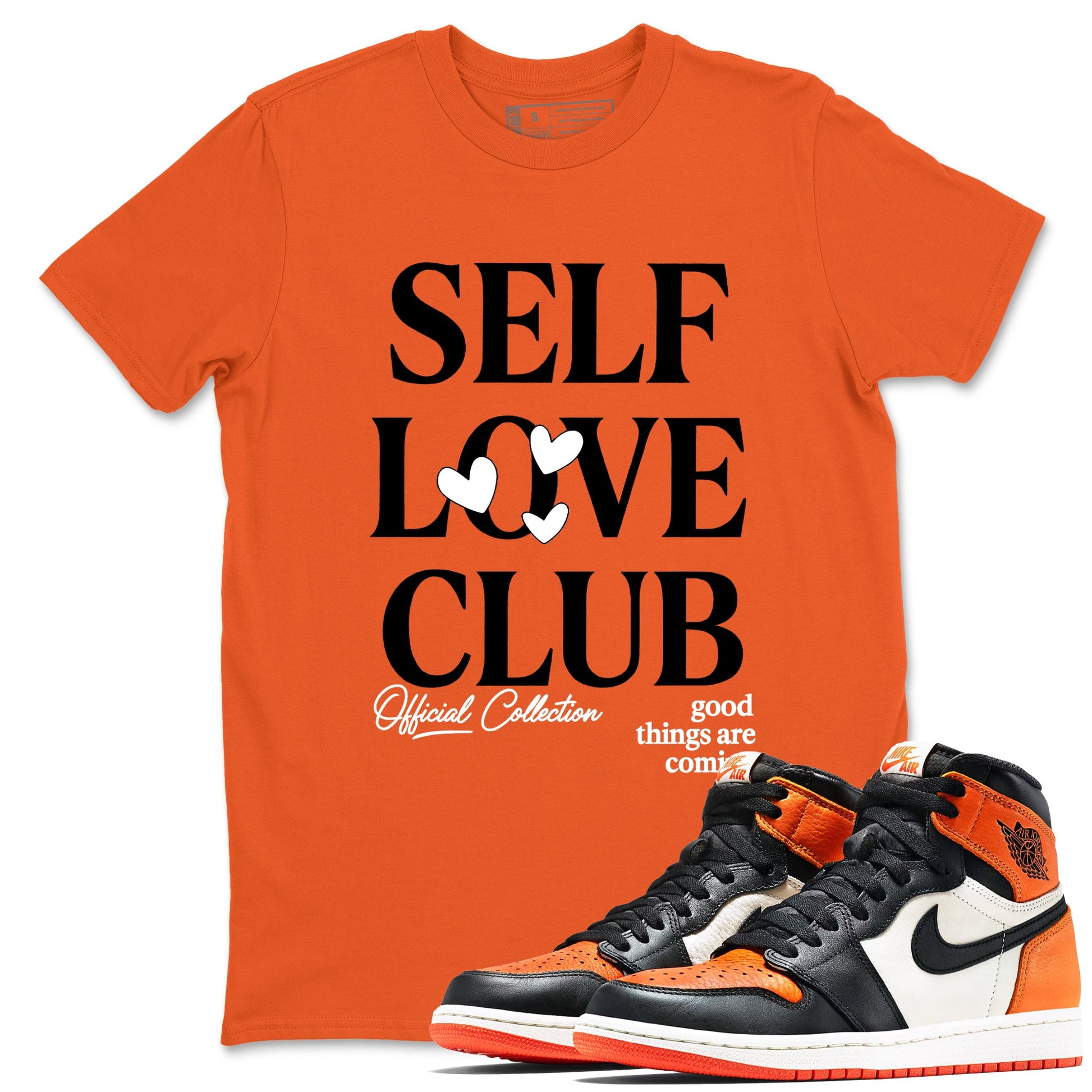 Self Love Club sneaker match t-shirt styled to complete your fit with the Air Jordan 1 Shattered Backboard sneakers, shown in Orange 1.