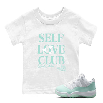 Self Love Club baby and kids t-shirt crafted for little sneakerheads to shine with the Air Jordan 11 Igloo sneakers, displayed in White 1.